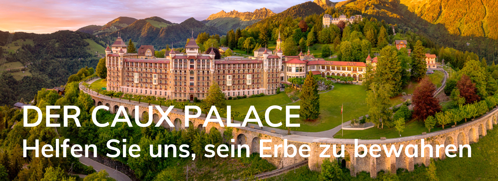 Caux Palace retaining wall banner DE