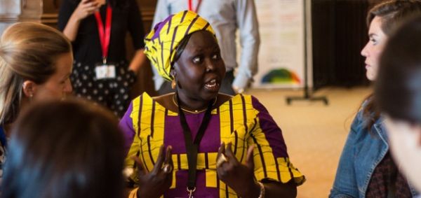 TIP 2018 - Black lady discussing