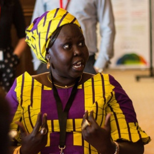 Land and Security in Sub-Saharan Africa: risks and possible responses TIP 2018 - Black lady discussing