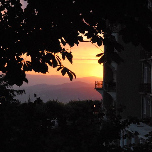 Climate and the economy in the post-COVID world Caux Palace view night