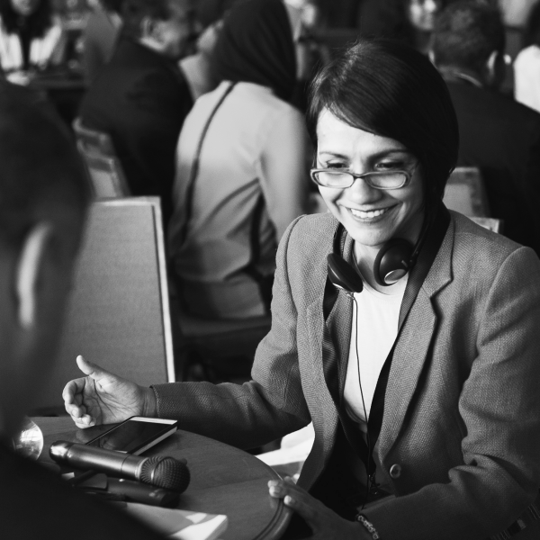 People main hall talking black and white